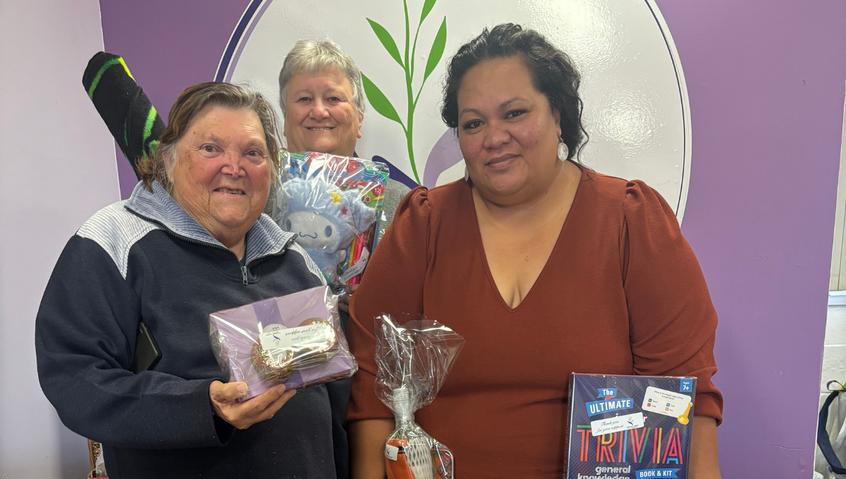 Photo of Leukaemia Support Queensland members preparing the prizes