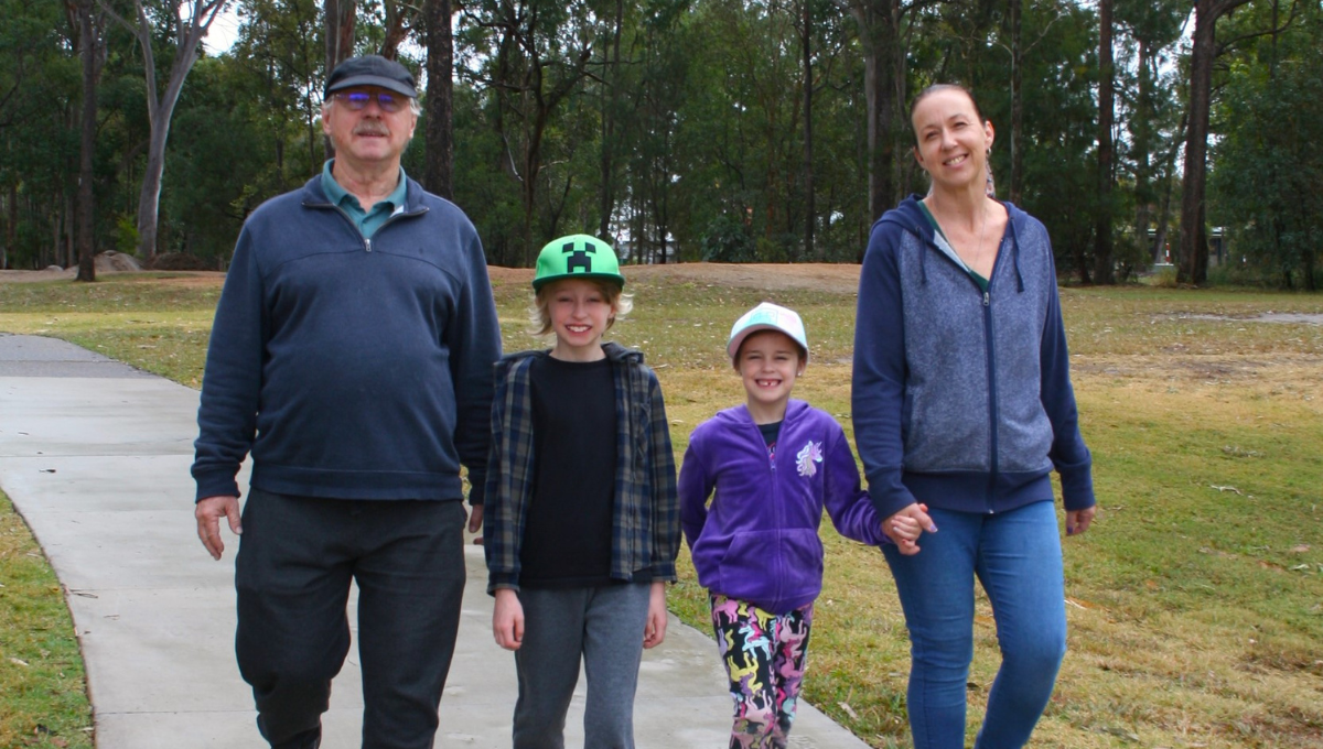 Family walking in a care-free park